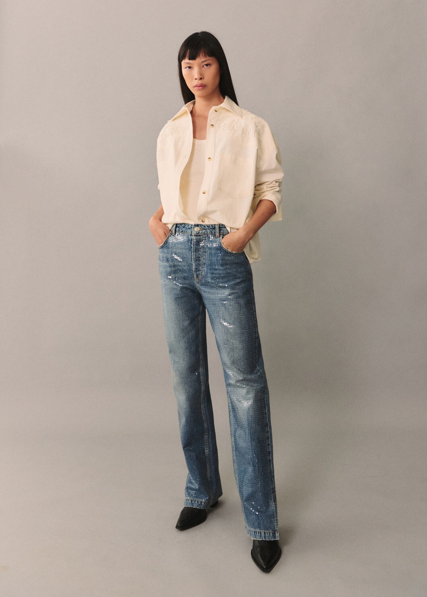Jeans with sequins under slits - General plane